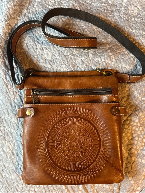 Patricia Nash Handbags - Patricia Nash Saddle Brown Leather Messenger bag with Embossed Medallion 82615